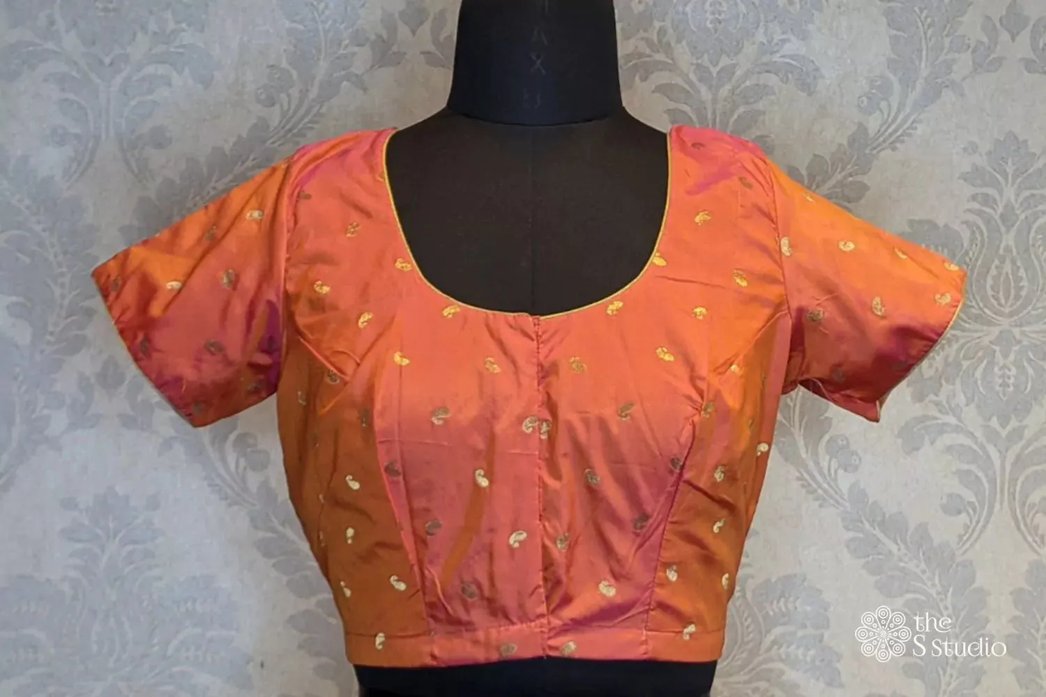 Peach with zari bhuttas silk blouse